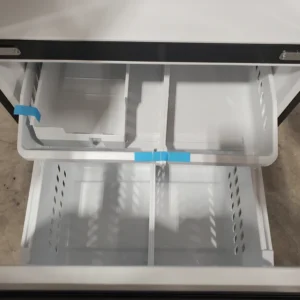 GE 33" Wide Stainless Steel ENERGY STAR 24.7 Cu. Ft. French-Door Refrigerator with Ice Maker and Water Dispenser 3SD883 - GNE25JYKFS - Open Box - Image 6